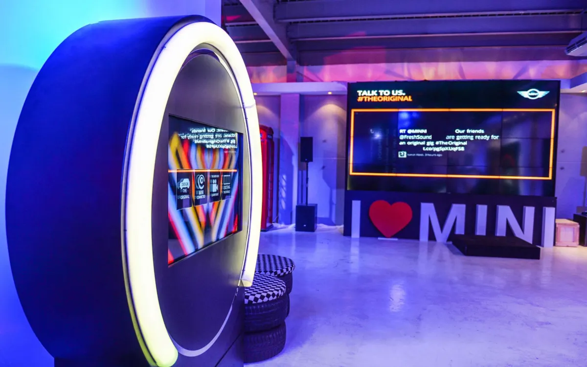 Circular illuminated MINI product display with interactive digital screens