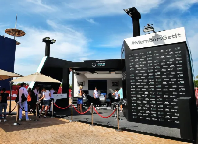 Mercedes-AMG activation booth with guest queue and branded photo backdrop